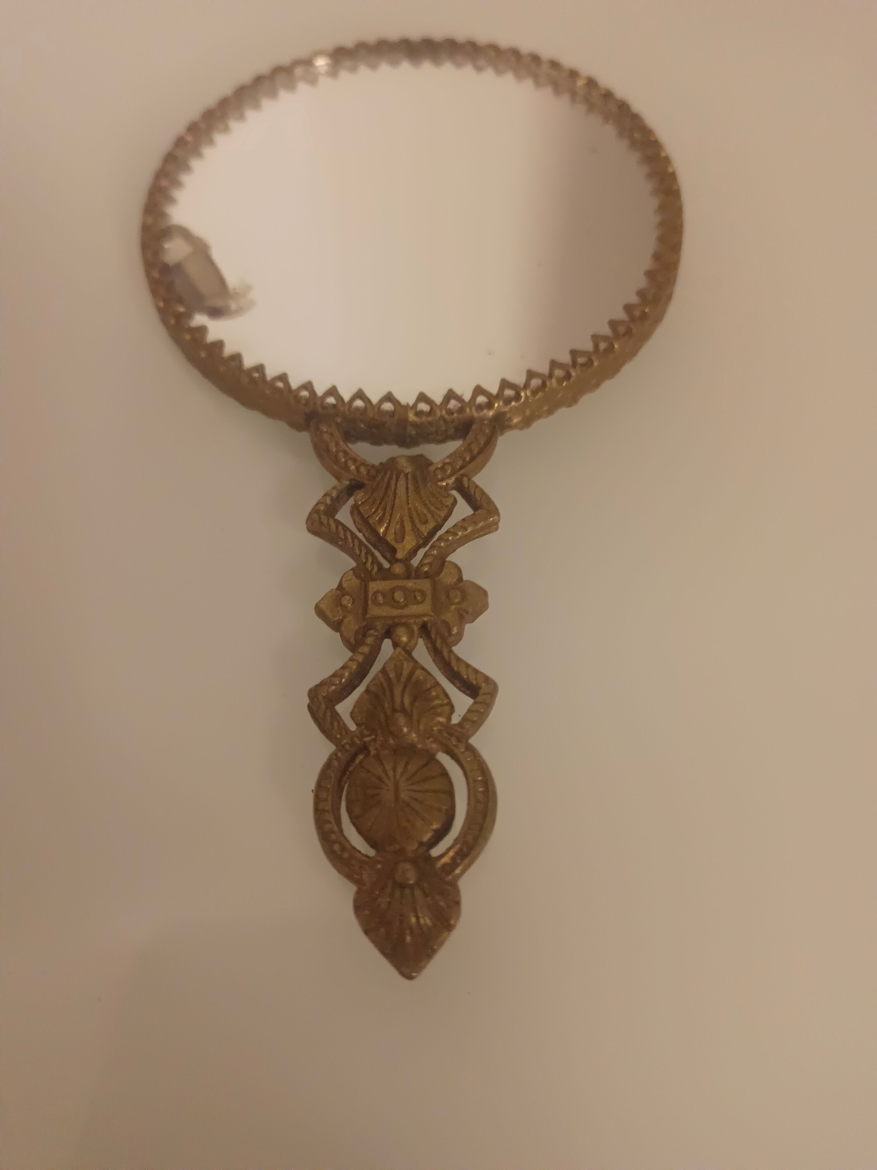 Brass hand mirror, 10 cm