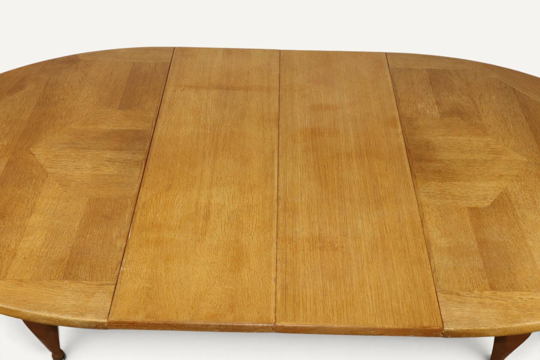 Extendable dining table in oak by Guillerme and Chambron - 1960s