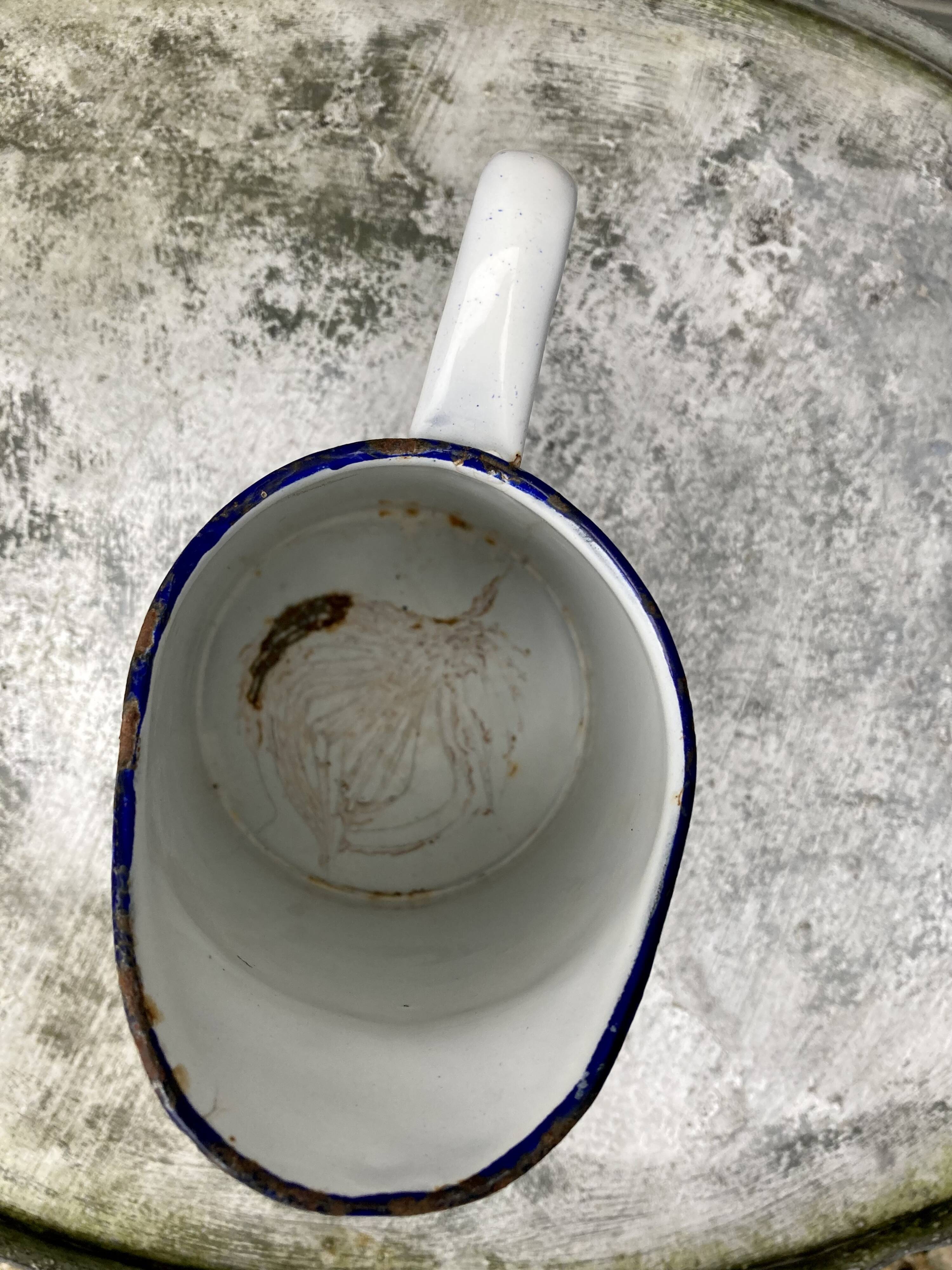 Small white enamelled broc