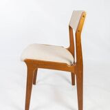 Set of dining room chairs in teak and upholstered with light fabric, designed by erik buch, 1960s