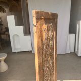 Rectangular Indonesian construction element with blue and yellow plant in carved wood