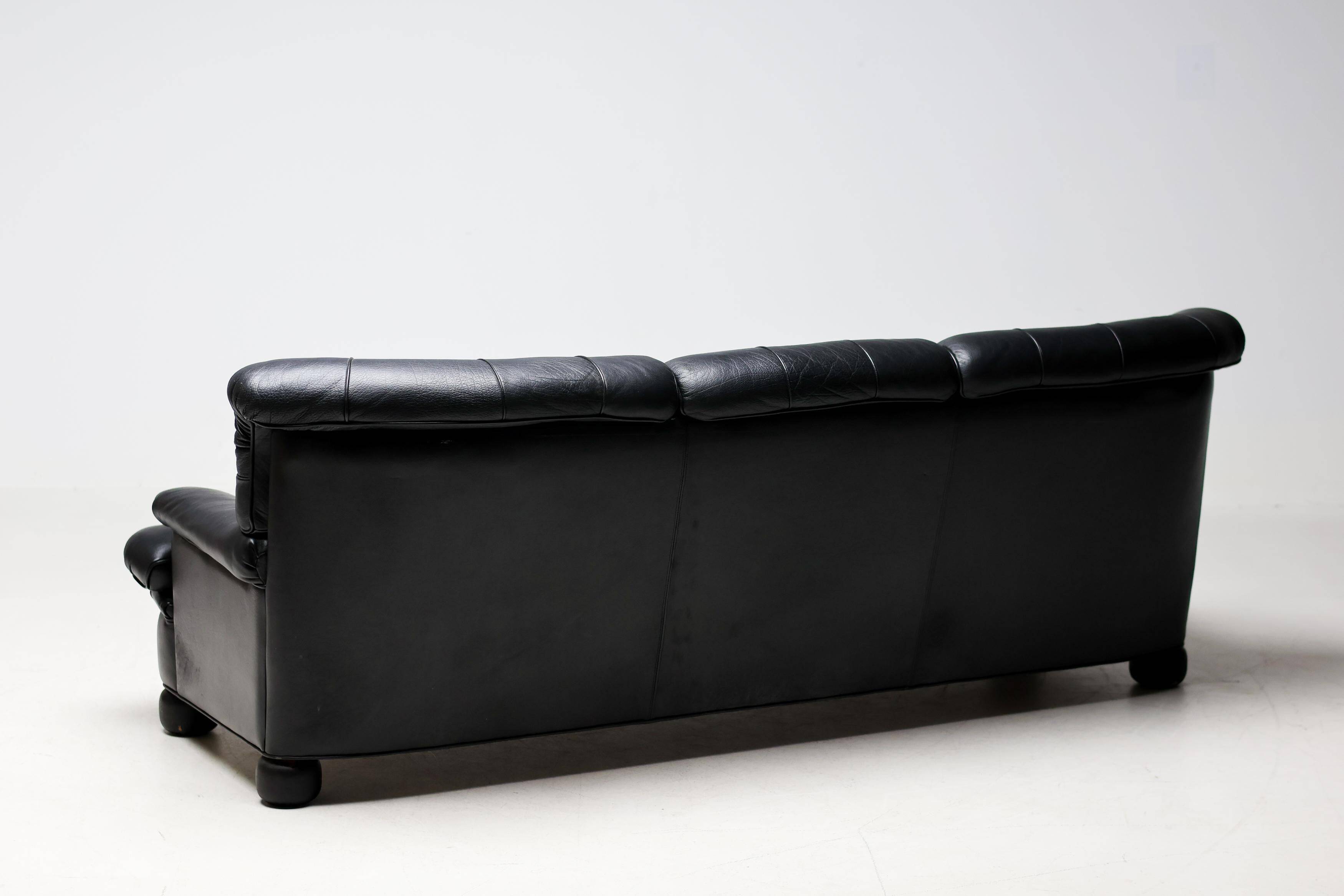 Three-seater sofa "Jupiter" in black leather by Arne Norell, Sweden, 1960.