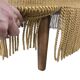 Set of 2 vintage 'gold' armchairs with fringes.