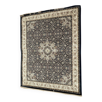 Classic navy blue living room rug decorated with flowers