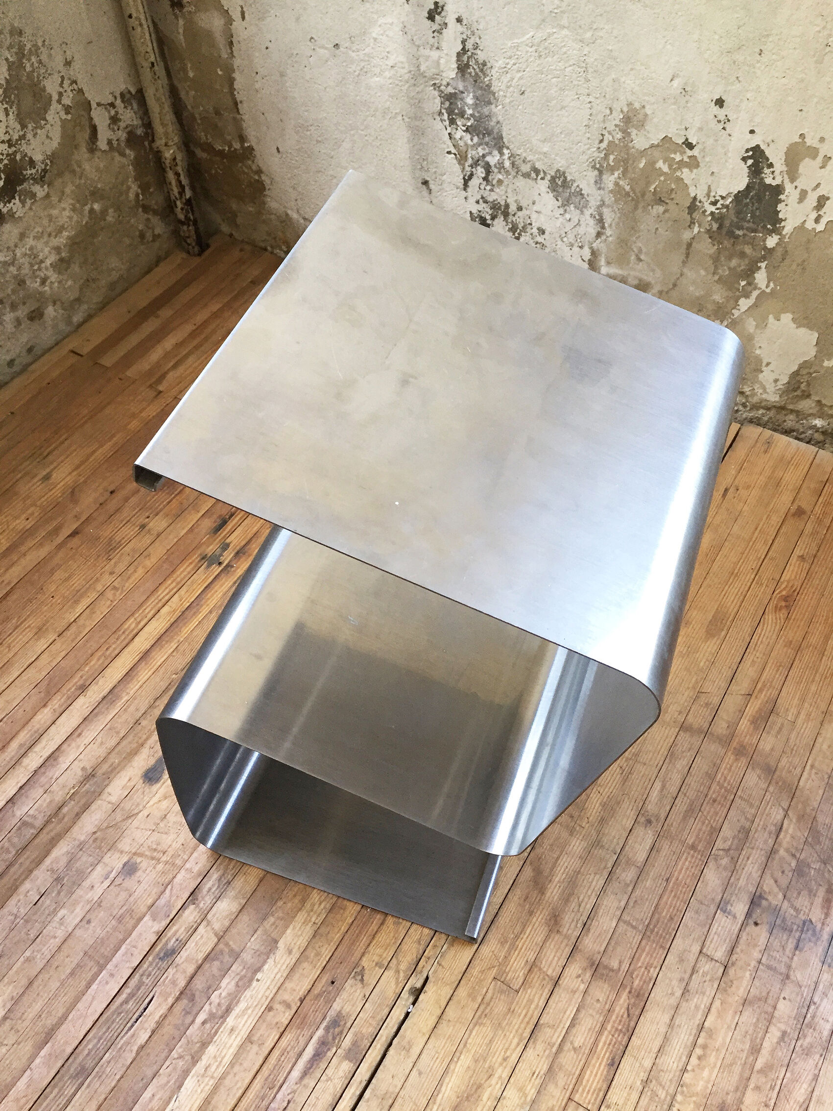 "Zig-zag" satin stainless steel shelf by Joelle Ferlande and François Monnet