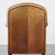 Stately, sleekly finished, comfortable sheepskin armchair