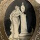 Miniature on ivory, oval brass frame.