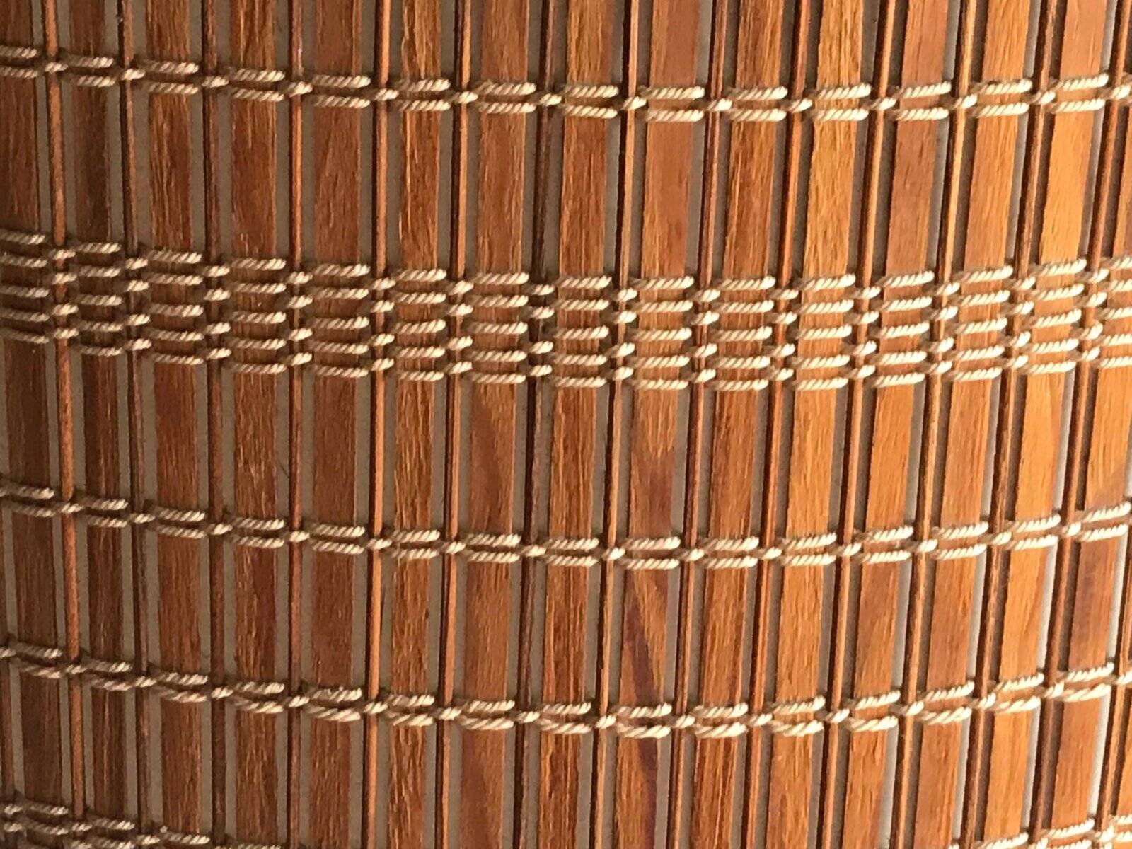 Mid-Century brown wooden and metal floor lamp, large diameter woven lampshade from the 1950s.