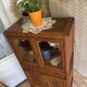 Old small glass display cabinet from the early 20th century.