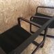 Pair of vintage armchairs in curved wood with suspended seat circa 1970-80.