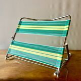 Vintage folding beach chair in chrome metal and woven plastic