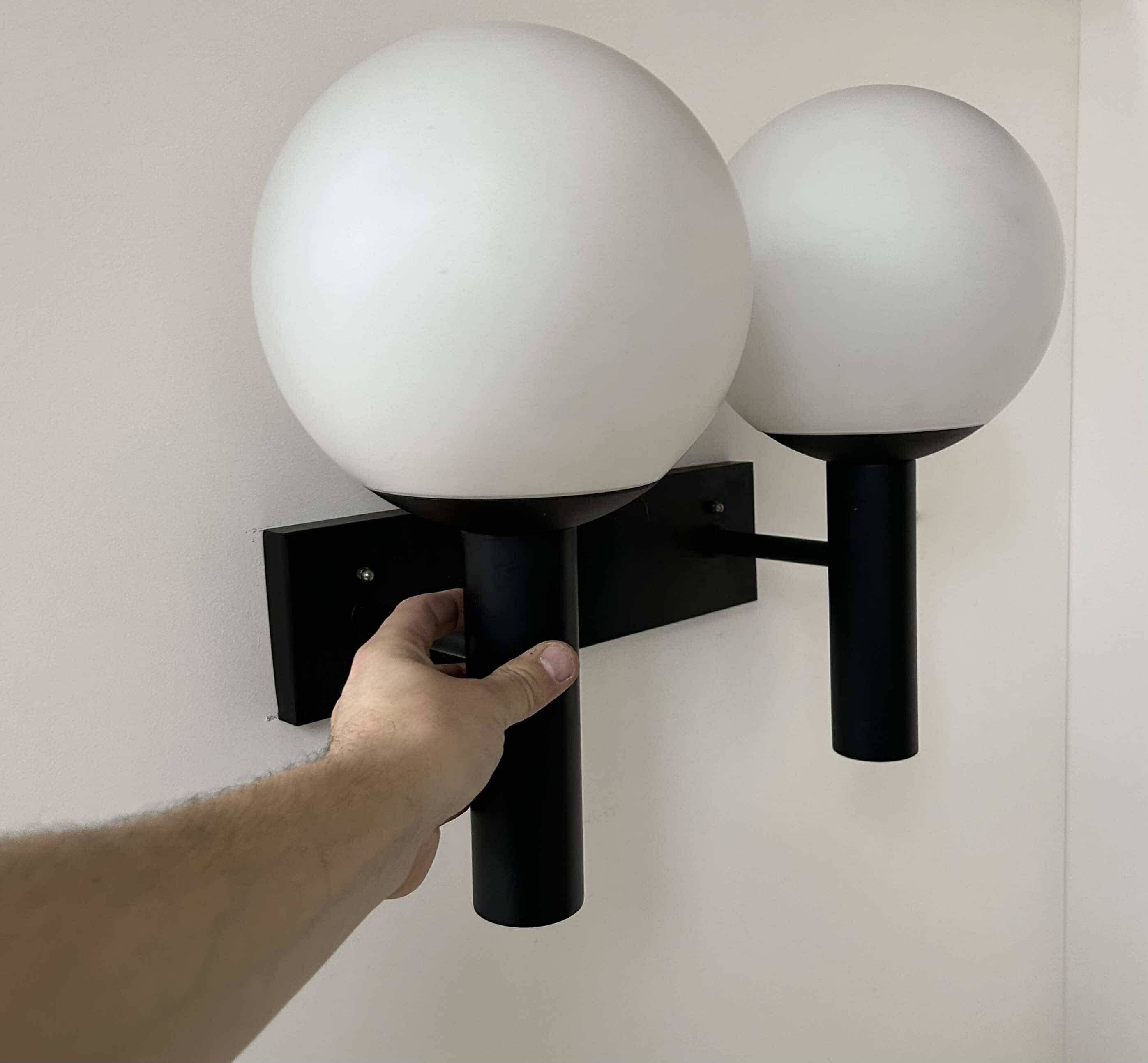 Vintage double wall lamp, opaline and black lacquered metal, Raak Netherlands 1960