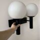 Vintage double wall lamp, opaline and black lacquered metal, Raak Netherlands 1960