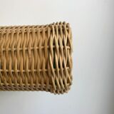 bottle surrounded by rattan 70s
