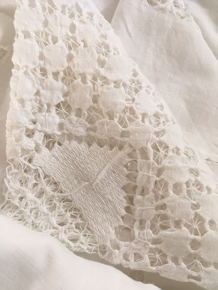 Net-style embroidered cotton tablecloth.