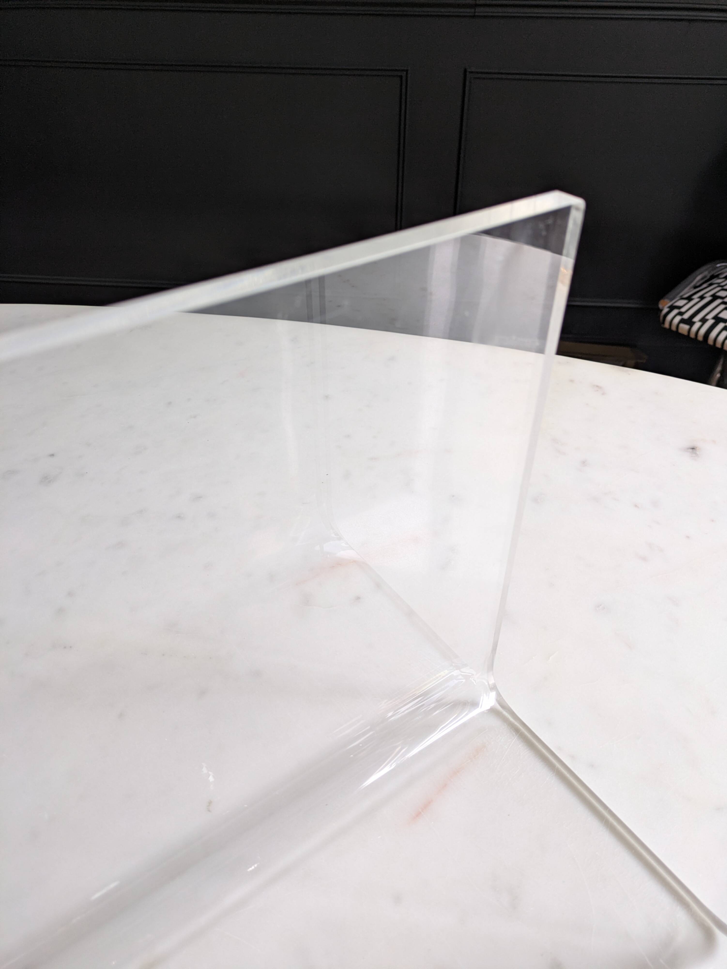 Plexiglass magazine rack by David Lange