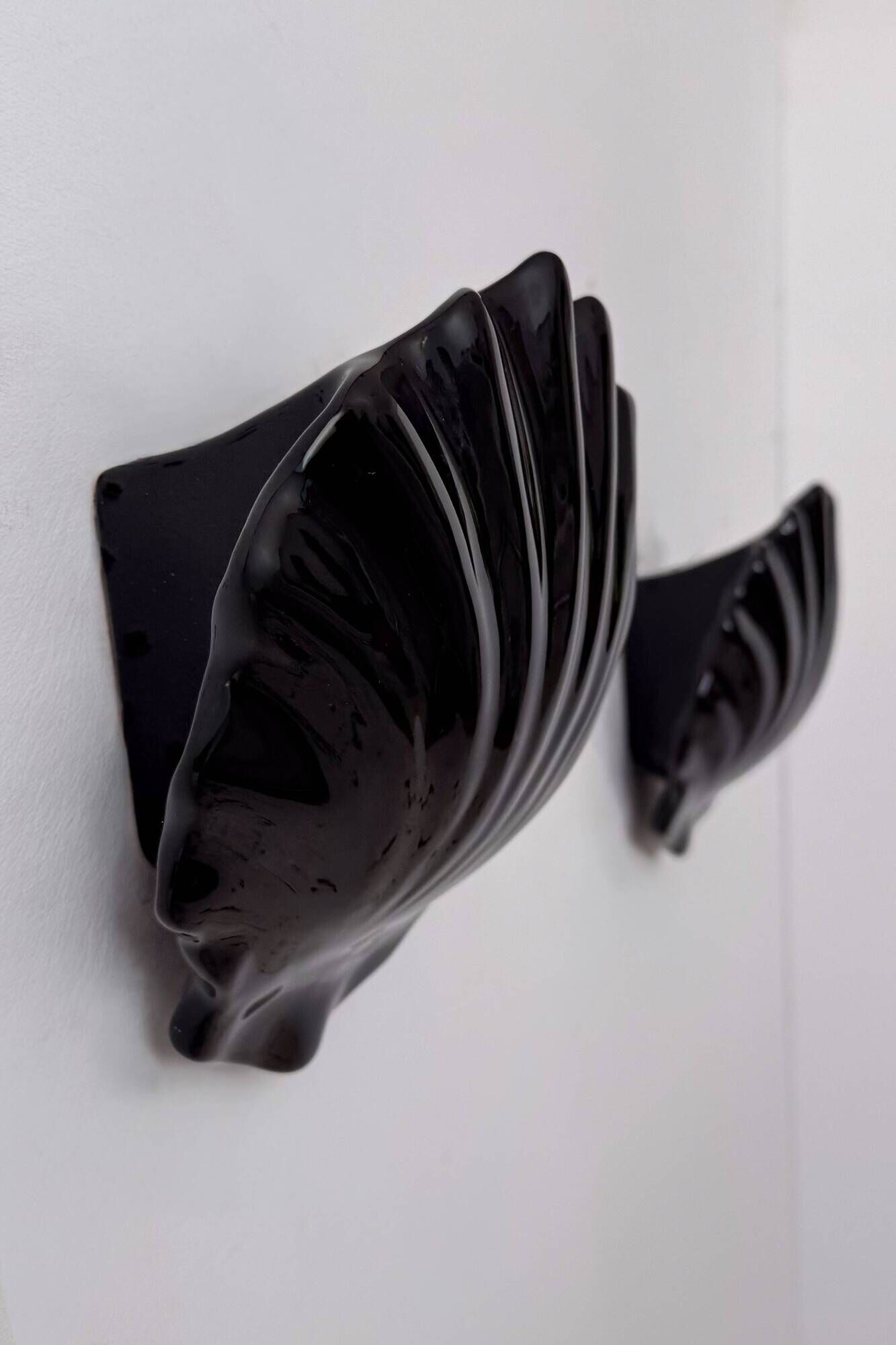 Pair of vintage wall lights in black porcelain, France 1970.
