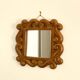 Carved wooden mirror