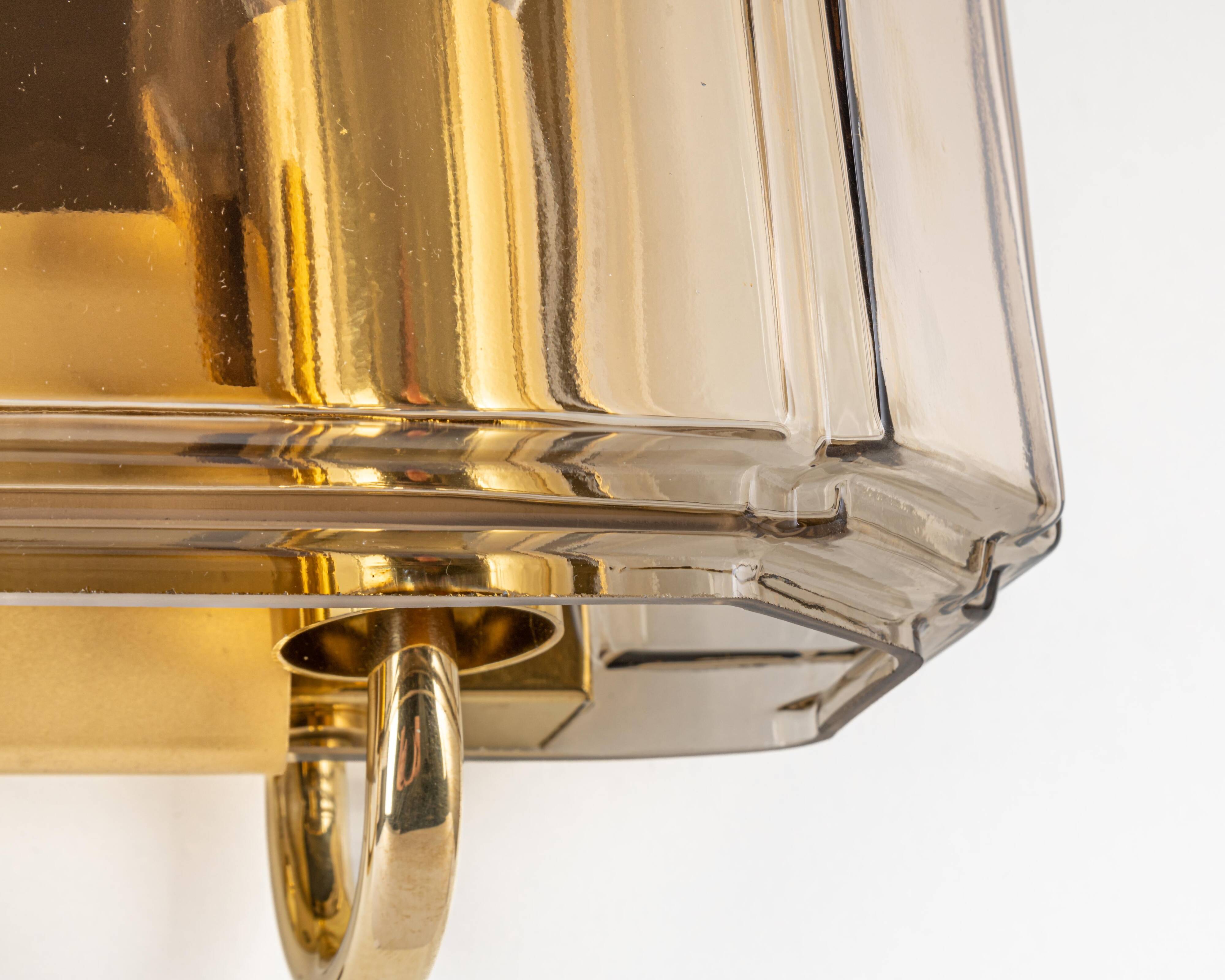 Large smoked glass wall sconces by Limburg, Germany.