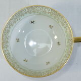 Green and gilded LIMOGES porcelain cup and cup lunch
