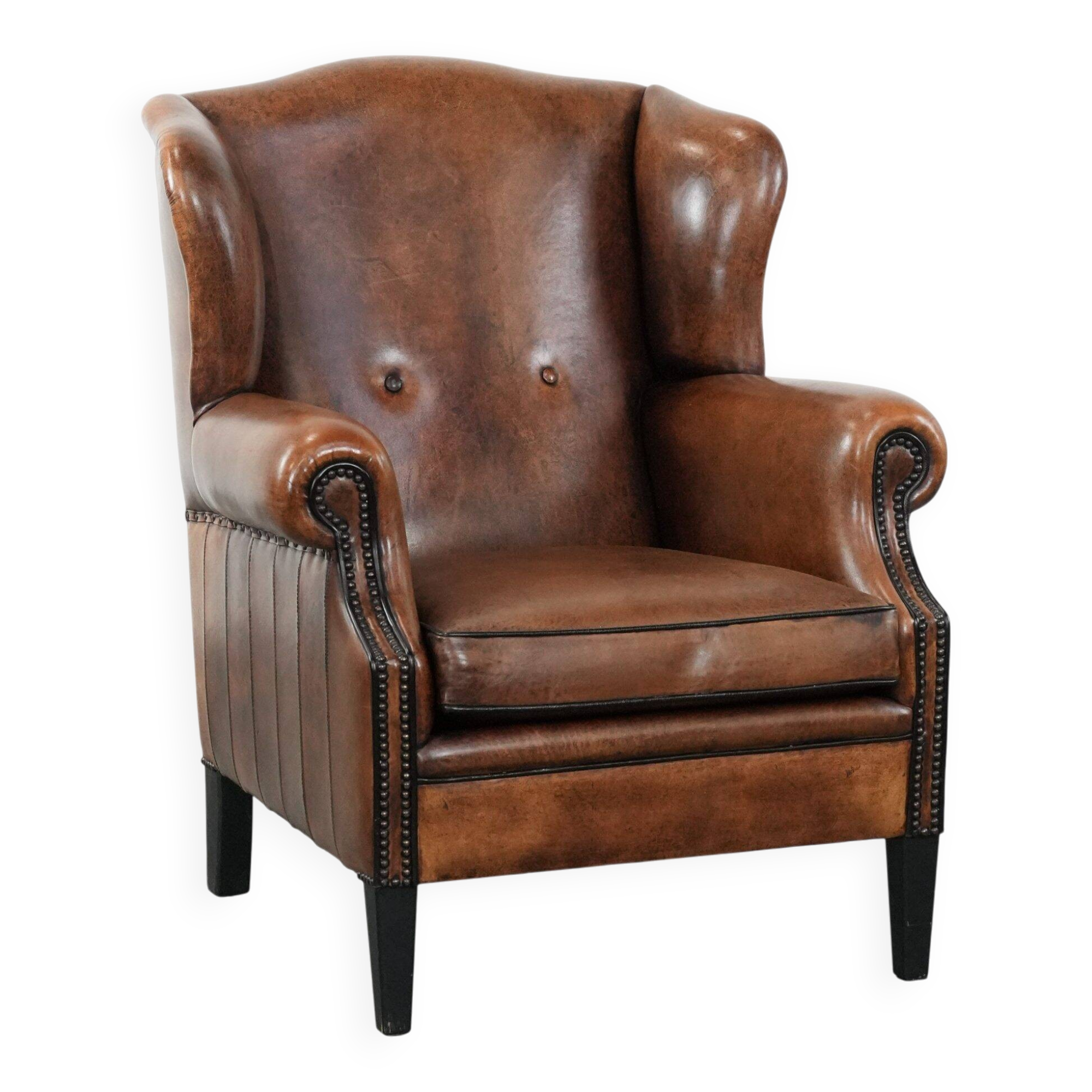 Timeless sheepskin wingback armchair with beautiful colours