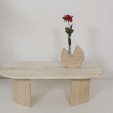 Oval travertine coffee table