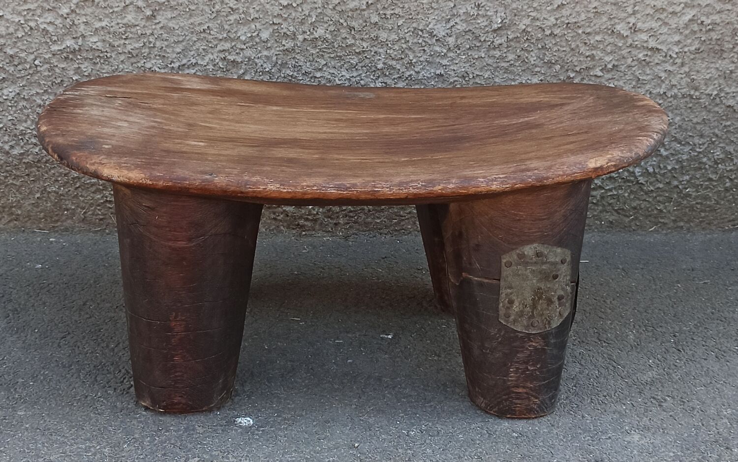 Antique wooden stool. Senufo African art from Côte d'Ivoire.