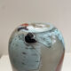 Blown opaline glass vase with coloured inclusions