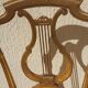 Paire de chaises à dossier lyre doré