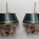 Pair of bronze and sheet metal hot water bottle wall lights