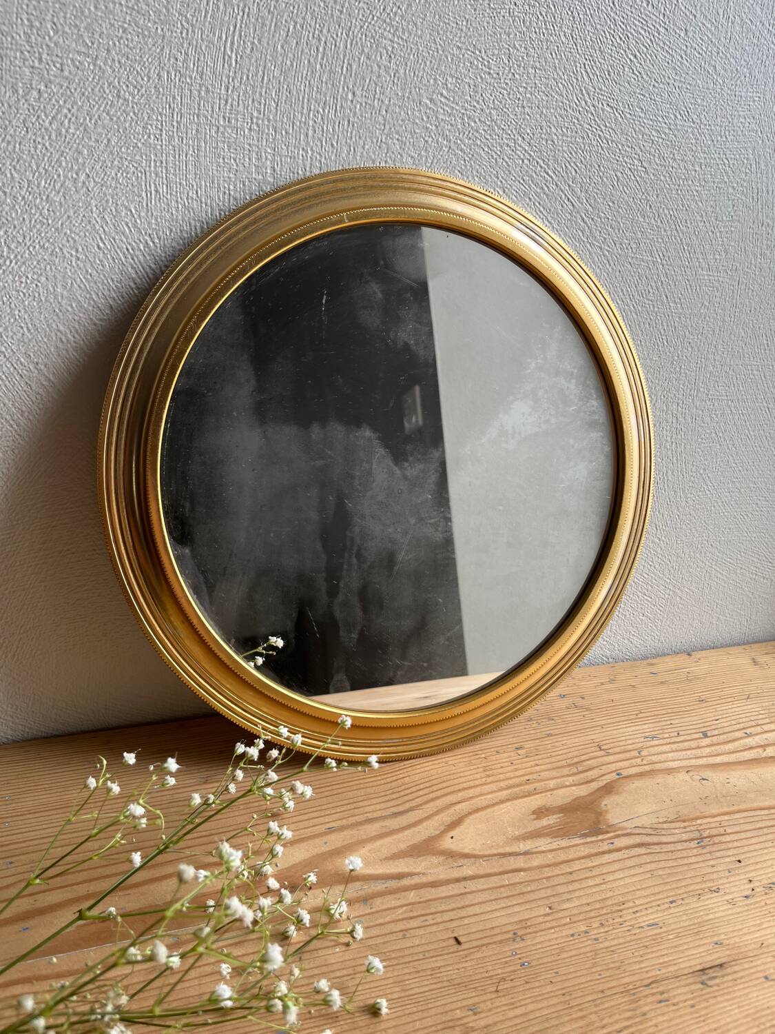 Vintage gold round mirror