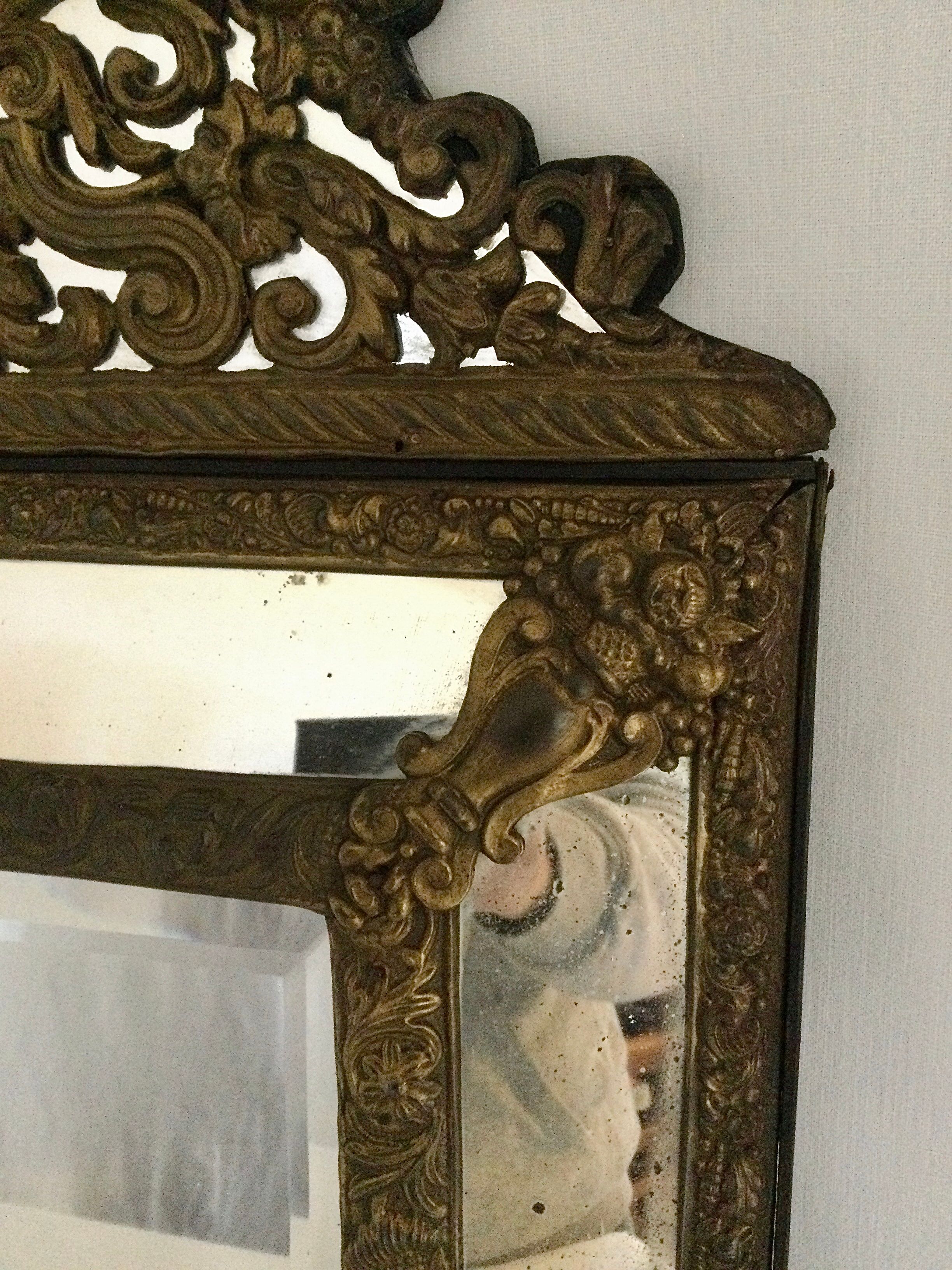 19th century embossed brass mirror with bead - 65x39cm