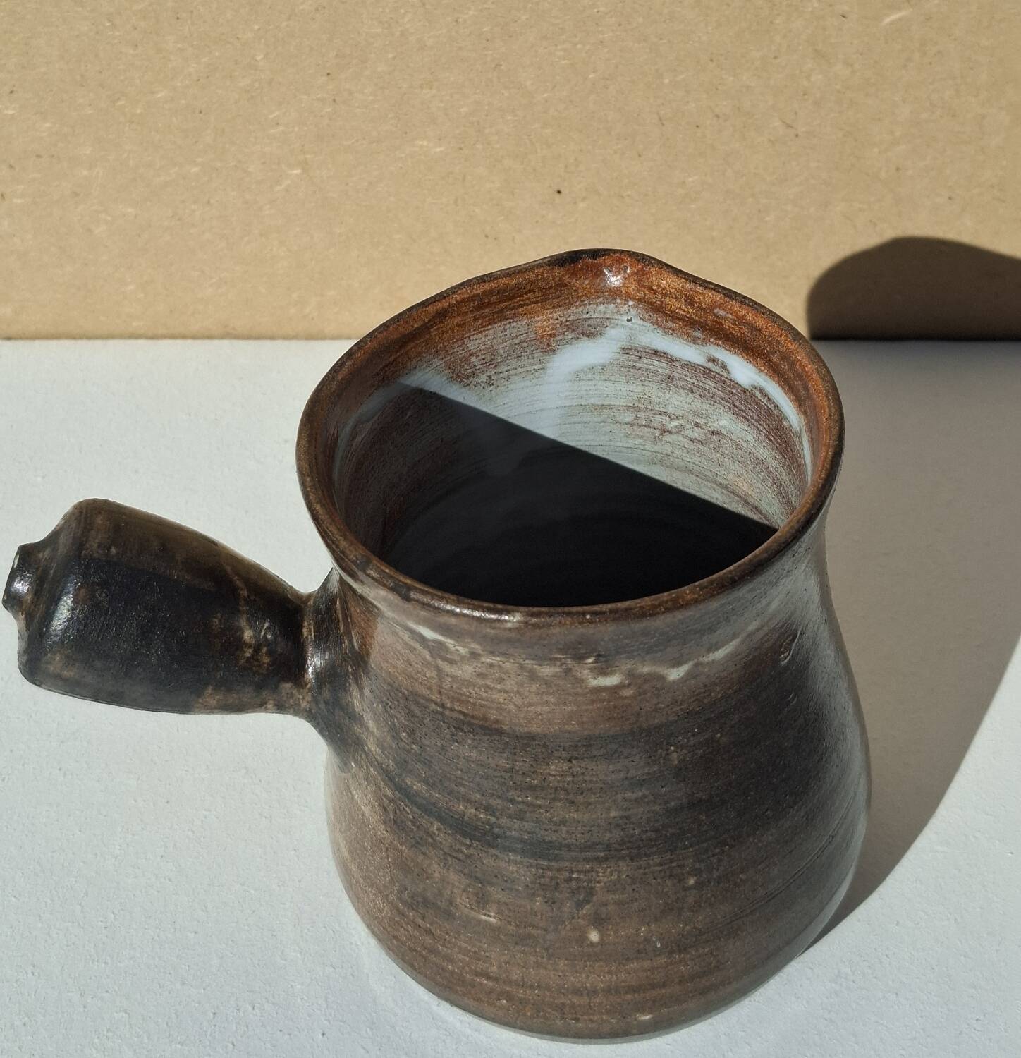 Stoneware pitcher signed by Jacques Pouchain.