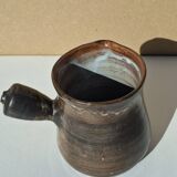 Stoneware pitcher signed by Jacques Pouchain.