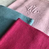 Suite of four antique tinted napkins