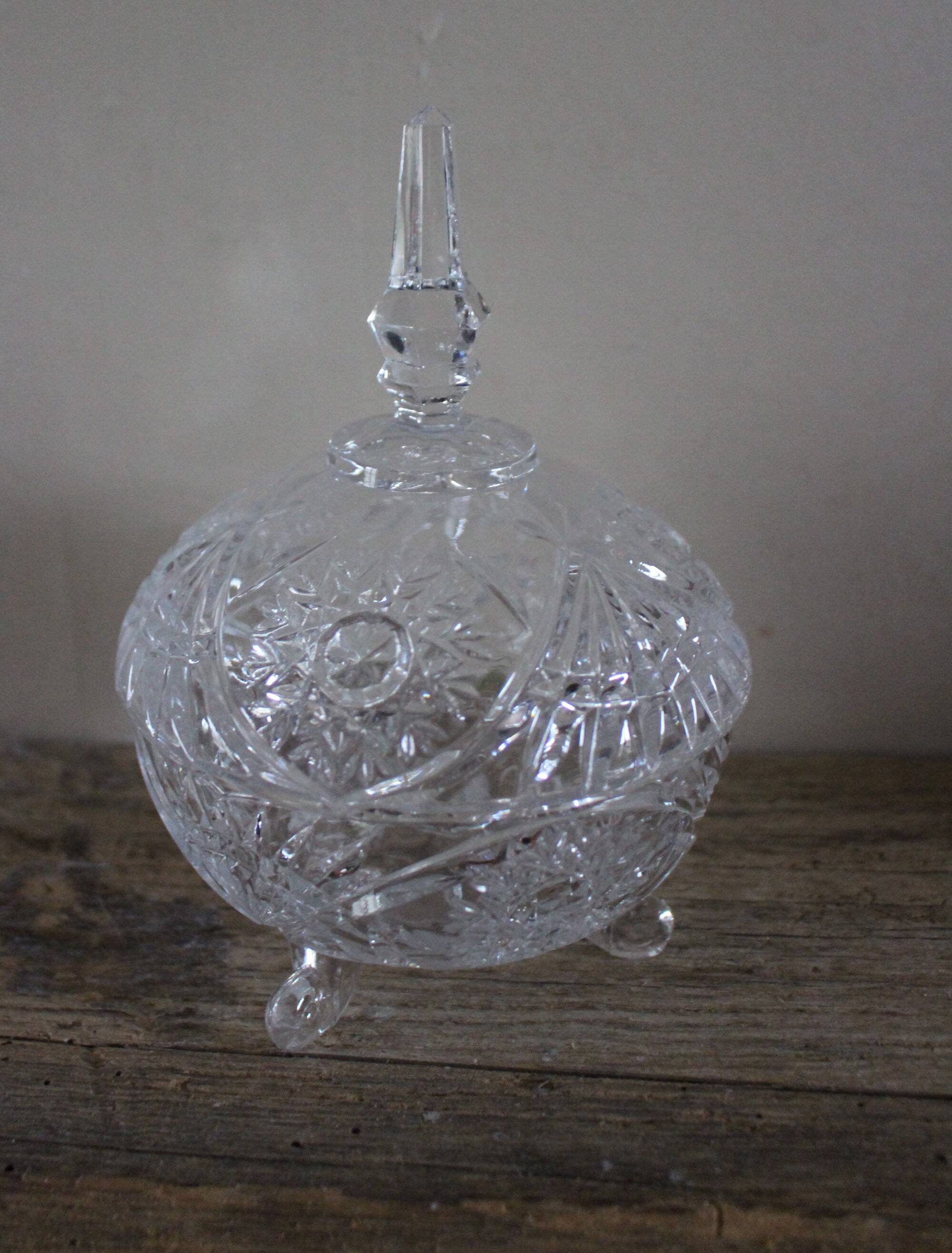 Cut glass sugar bowl on a stand