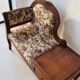 Antique wooden telephone bench in dark brown.