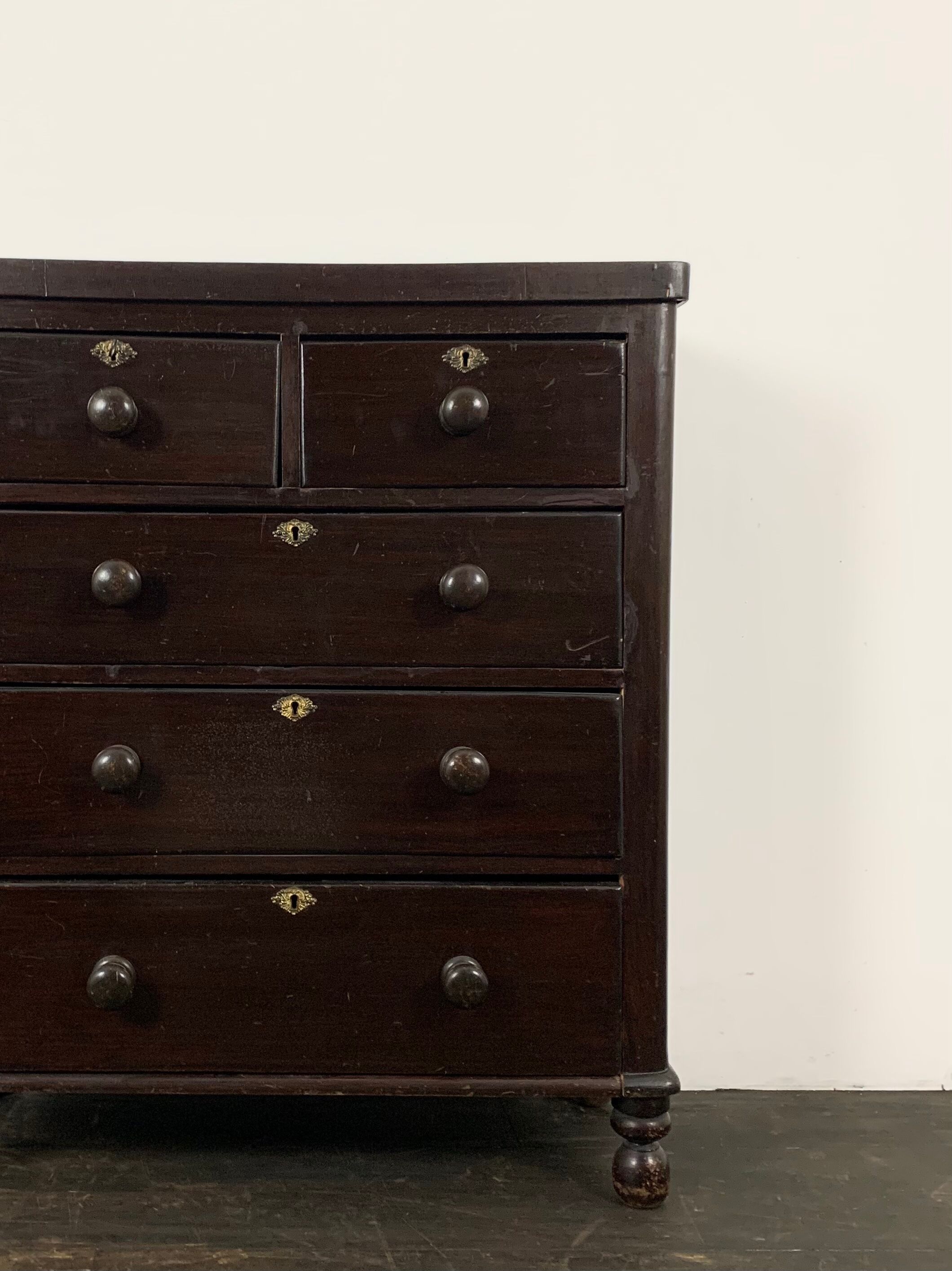 Dark antique chest of drawers