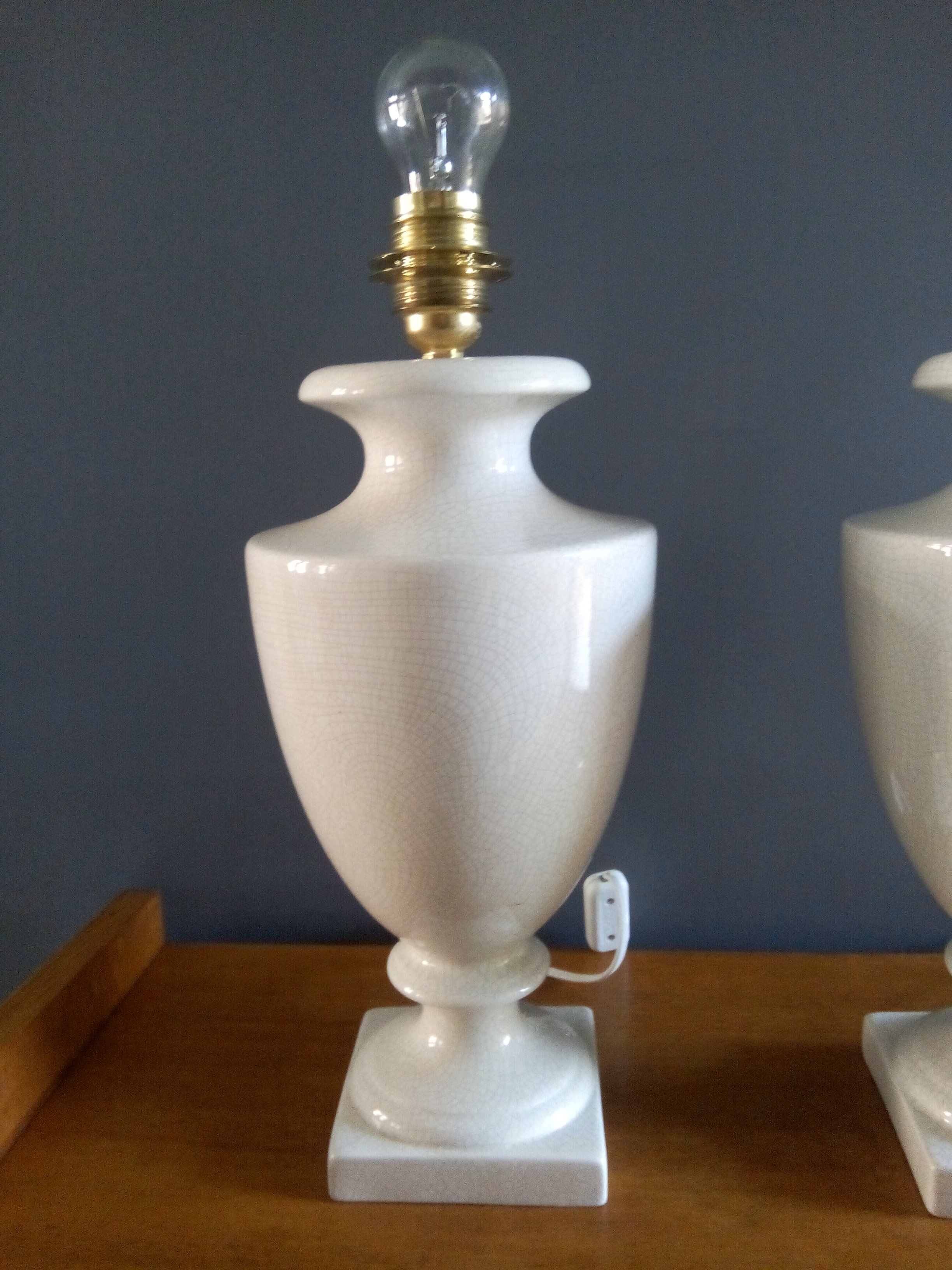 Pair of legs of cracked earthenware lamps