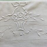 Old flat sheet embroidered and hand-opened