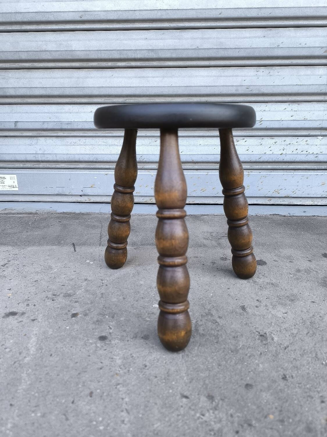 Turned wooden tripod stool