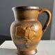 Speckled stoneware jug with grape pattern H17