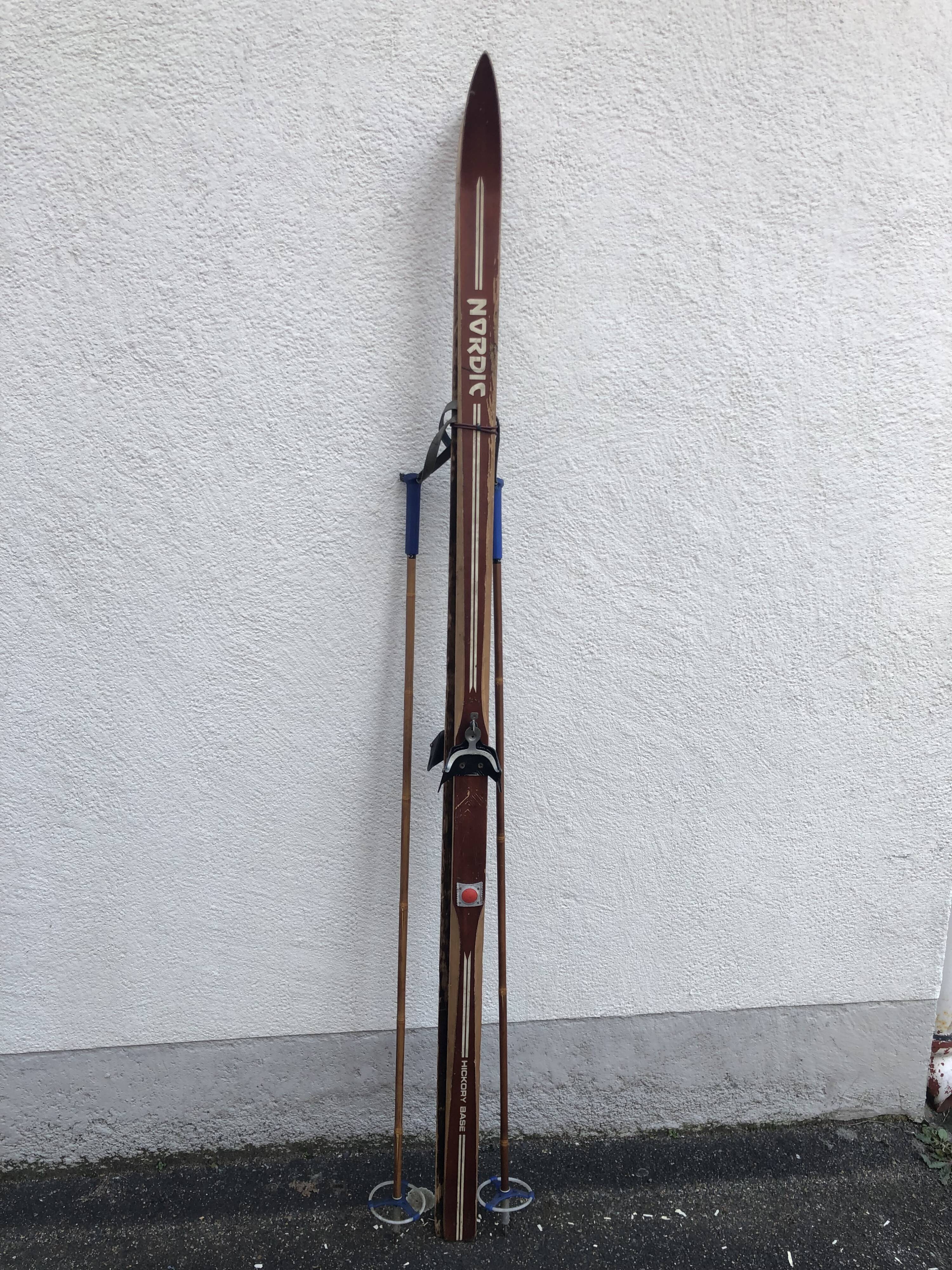 Vintage skis with poles