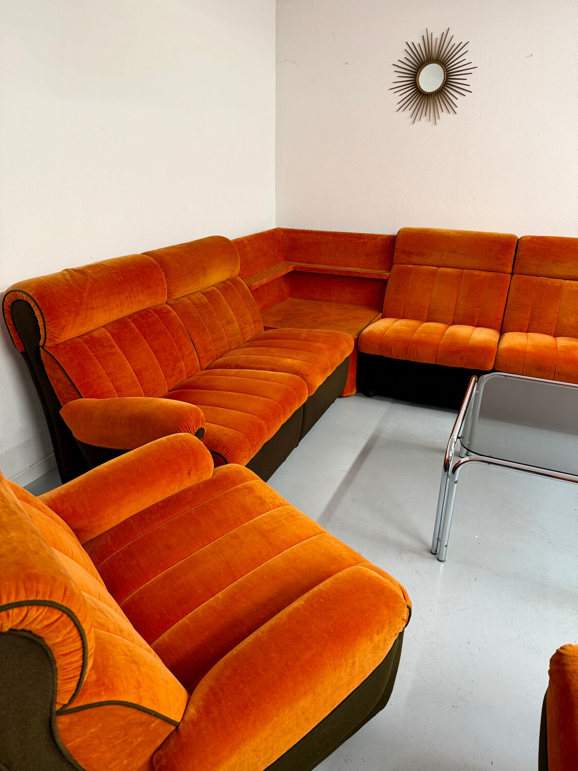 Modular vintage orange corner sofa, 1970s pop design.