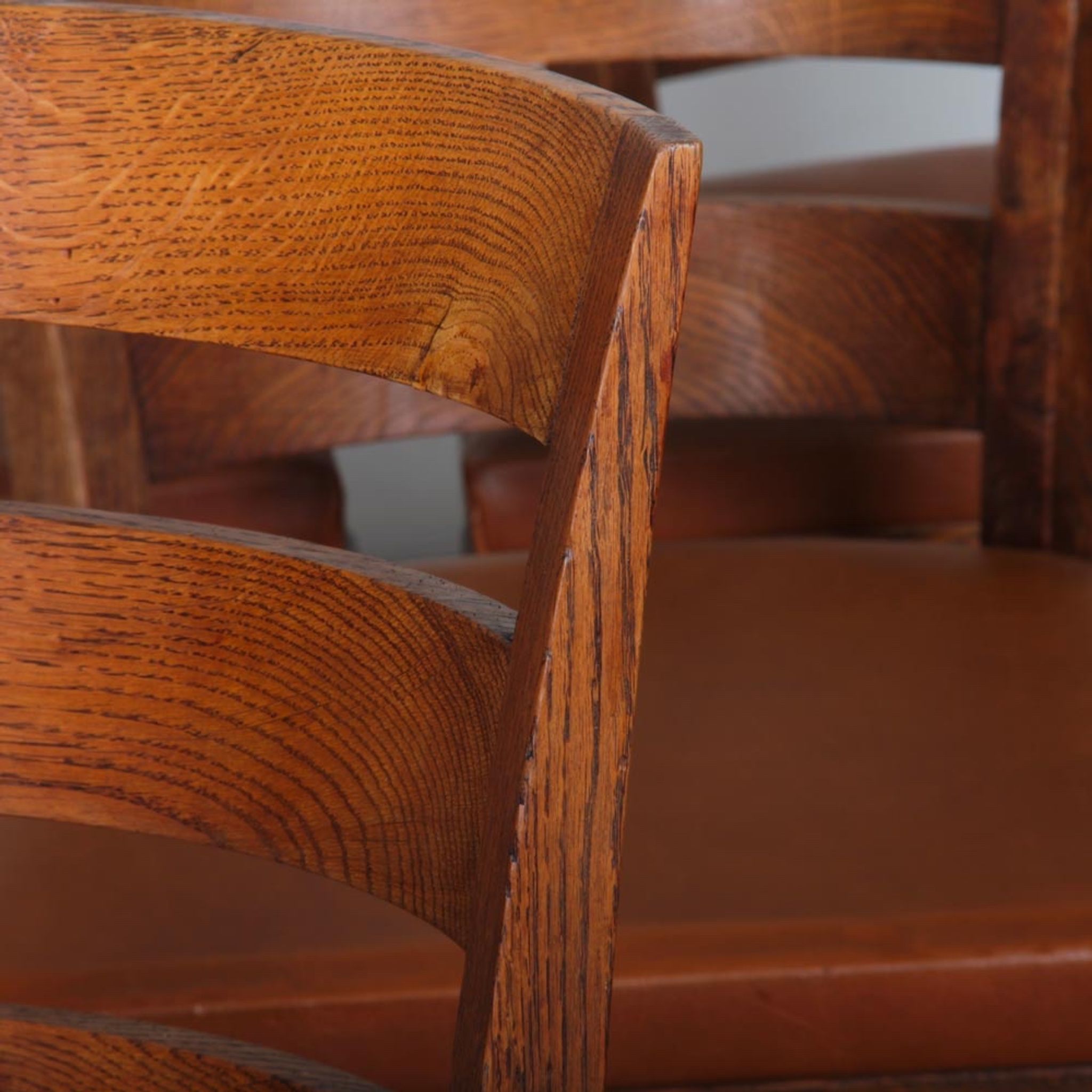 Set of 6 oak chairs in the style of Jean Pascaud, 1940.