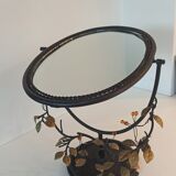 Table mirror, tilting psyche in patinated bronze decorated with leaves and fruits