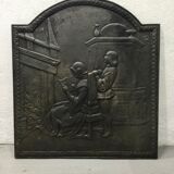 Fireplace plate "reading girl in front of the fire"