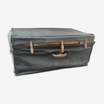 Vintage wicker suitcase sheathed