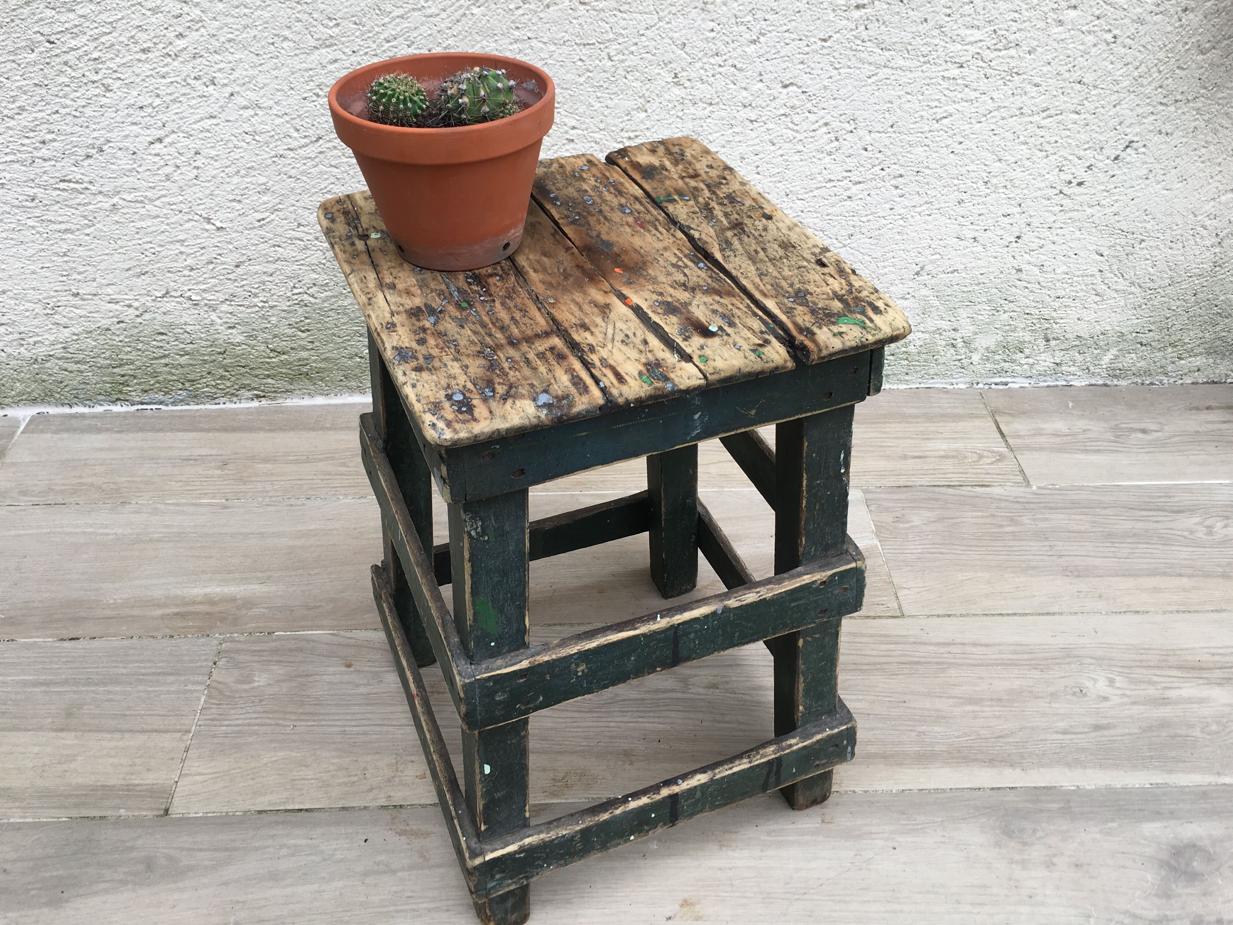 Former green workshop stool