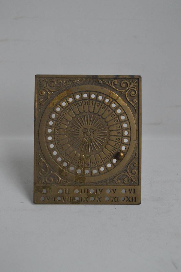 Brass perpetual calendar